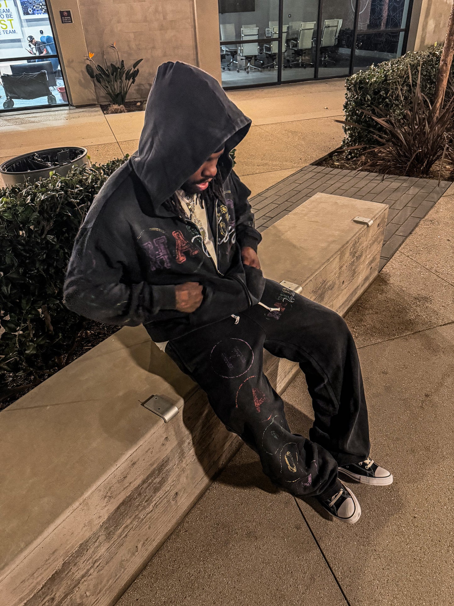 black sweatsuit